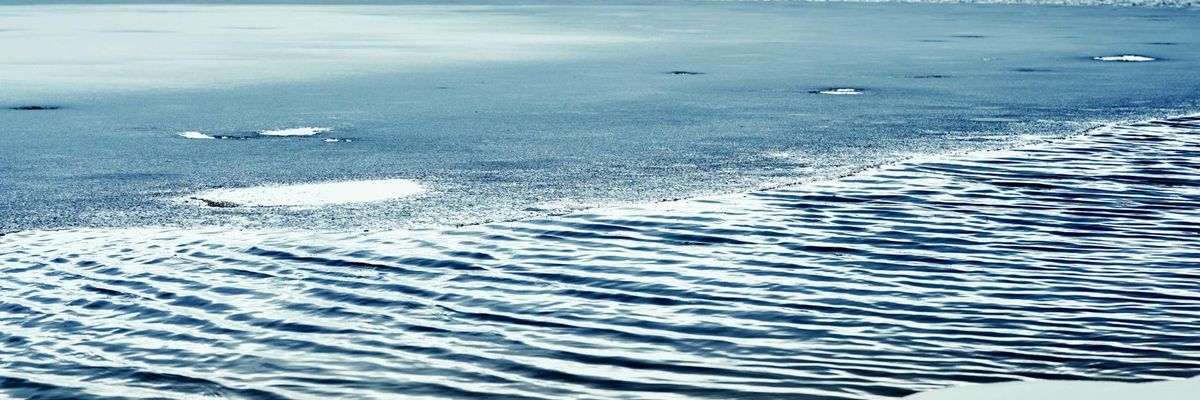 Minimalist frozen lake surface with clean lines